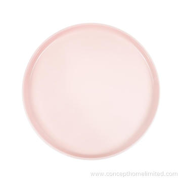 Reactive glazed stoneware dinner set in Pink